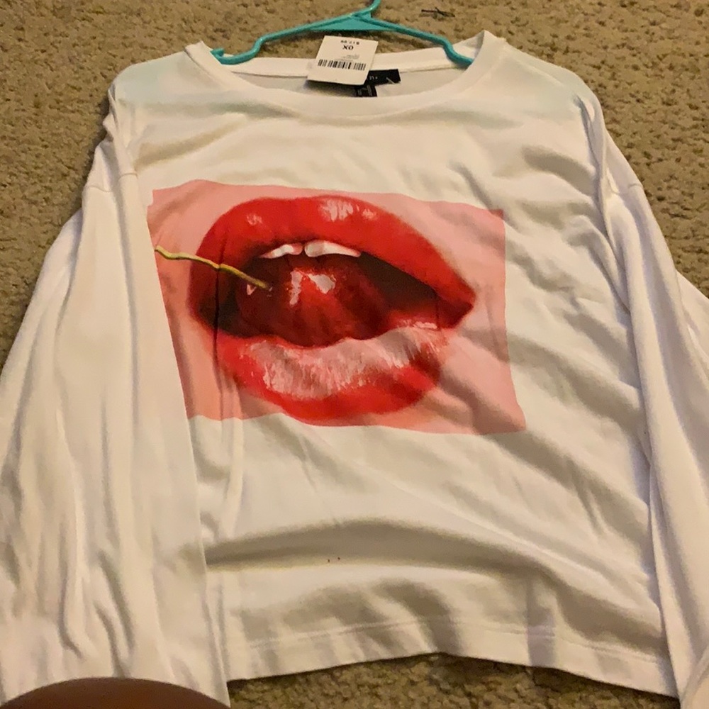 White long sleeve with red lips and a cherry